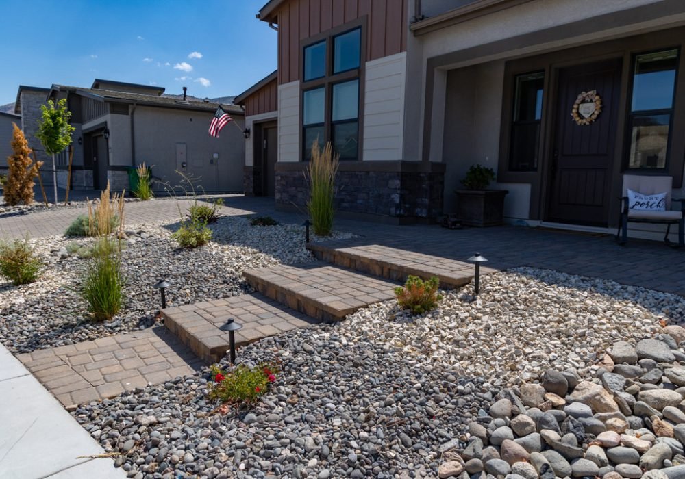 Paver walk and steps with xeriscape landscaping