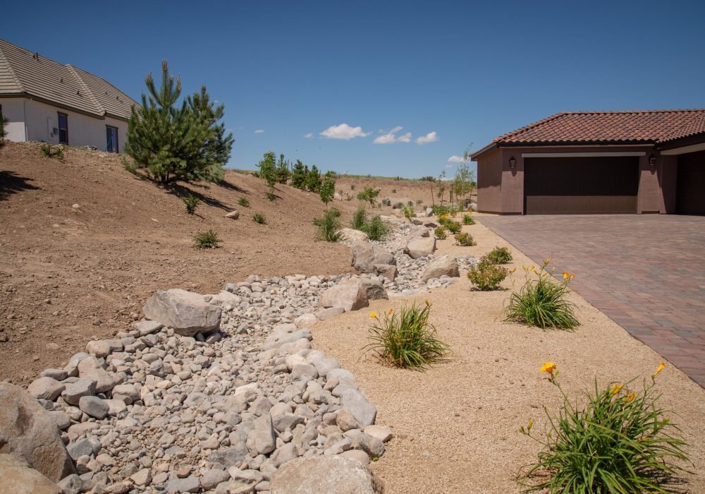 Dry creek with river rock and boulders, residential, Gail Willey Landscaping Reno, Nevada