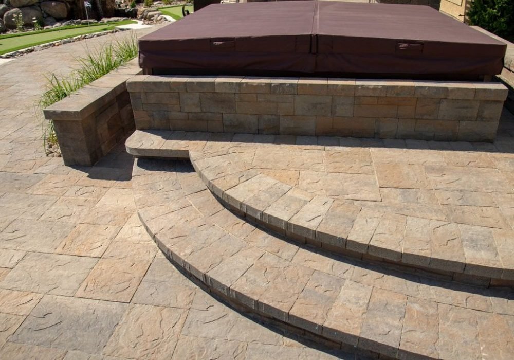 paver steps leading to a hot tub Landscaping reno nevada tahoe california