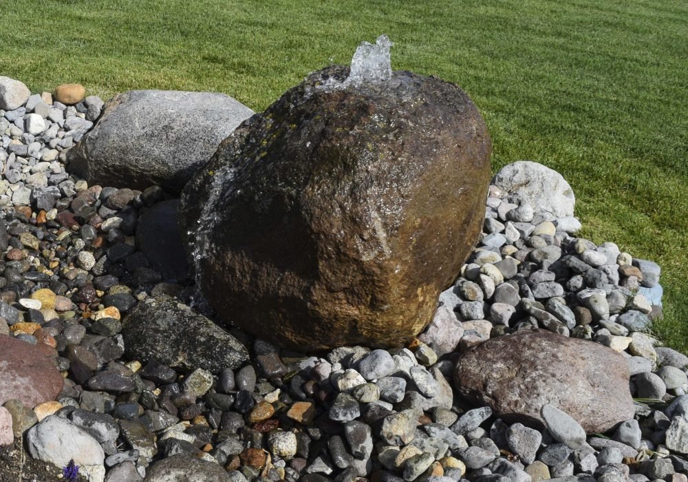 Cored and engraved Boulders with Name or address/