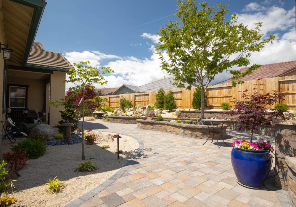 Paver patio and walkway with retainer walls for planting beds landscaping reno nevada tahoe california